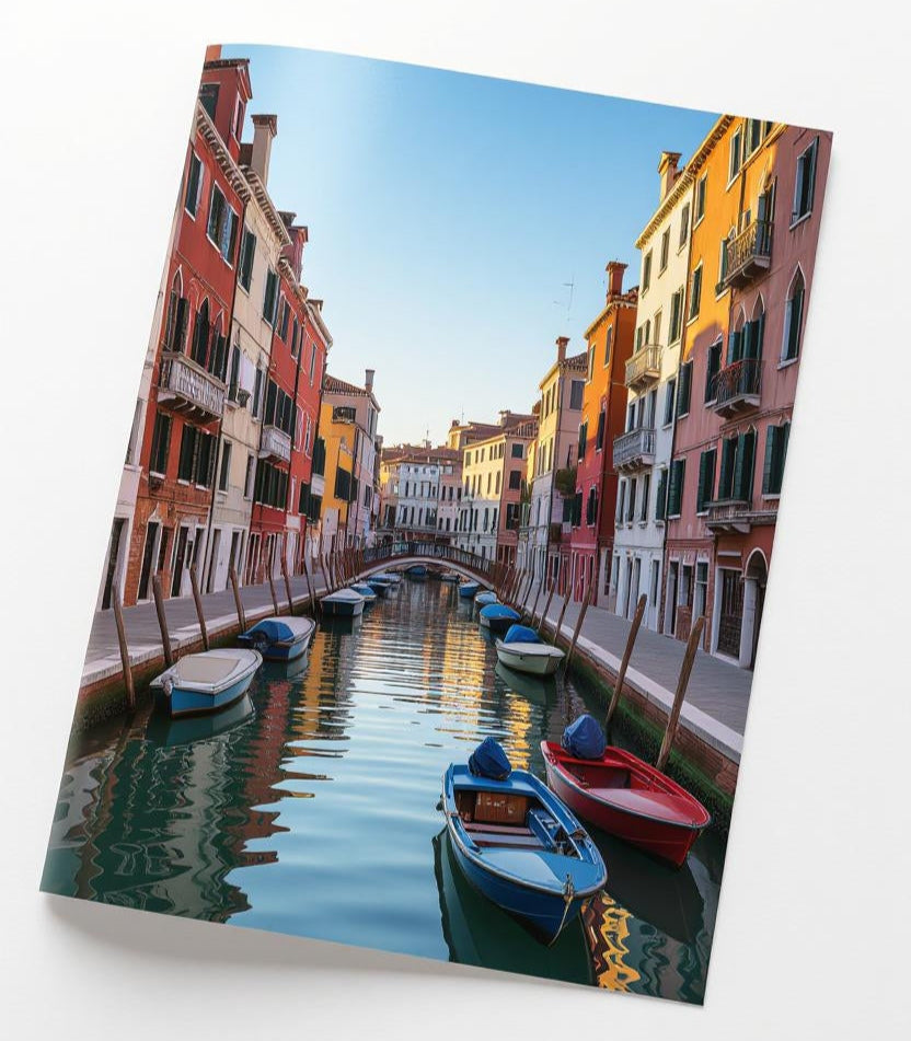 Framed photograph of a canal scene with boats and colorful buildings in Venice