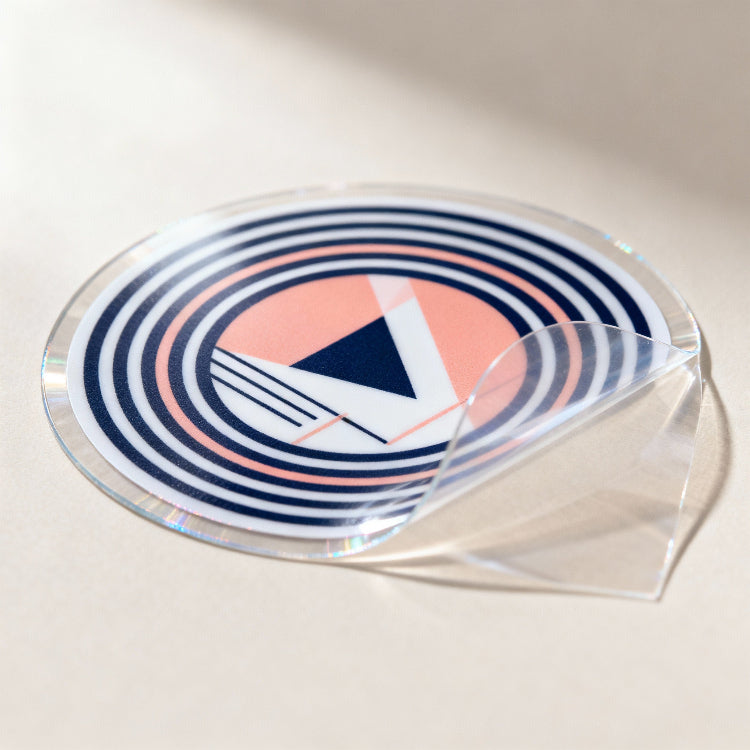 Circular sticker with geometric design on a beige background