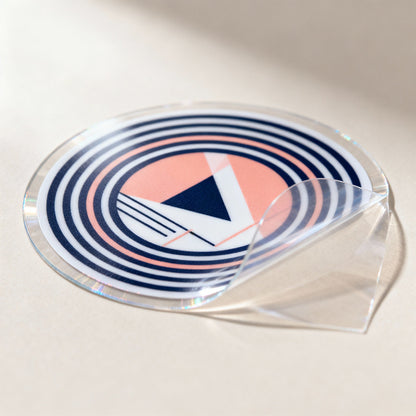 Circular sticker with geometric design on a beige background