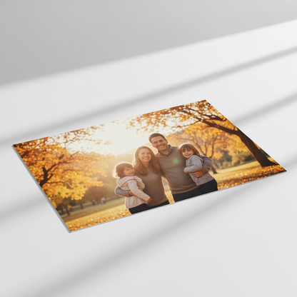 Family photo on a printed paper with autumn leaves in the background
